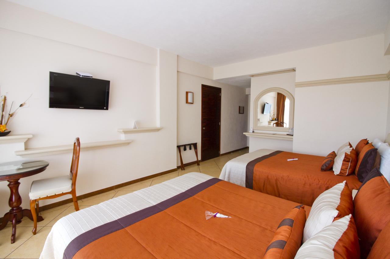 Hotel 9 Manantiales Чигнауапан Экстерьер фото