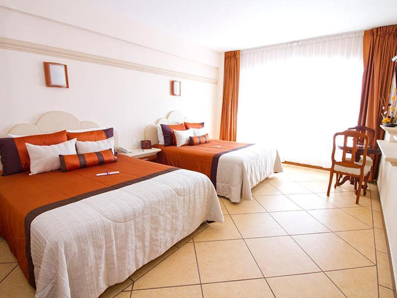 Hotel 9 Manantiales Чигнауапан Экстерьер фото